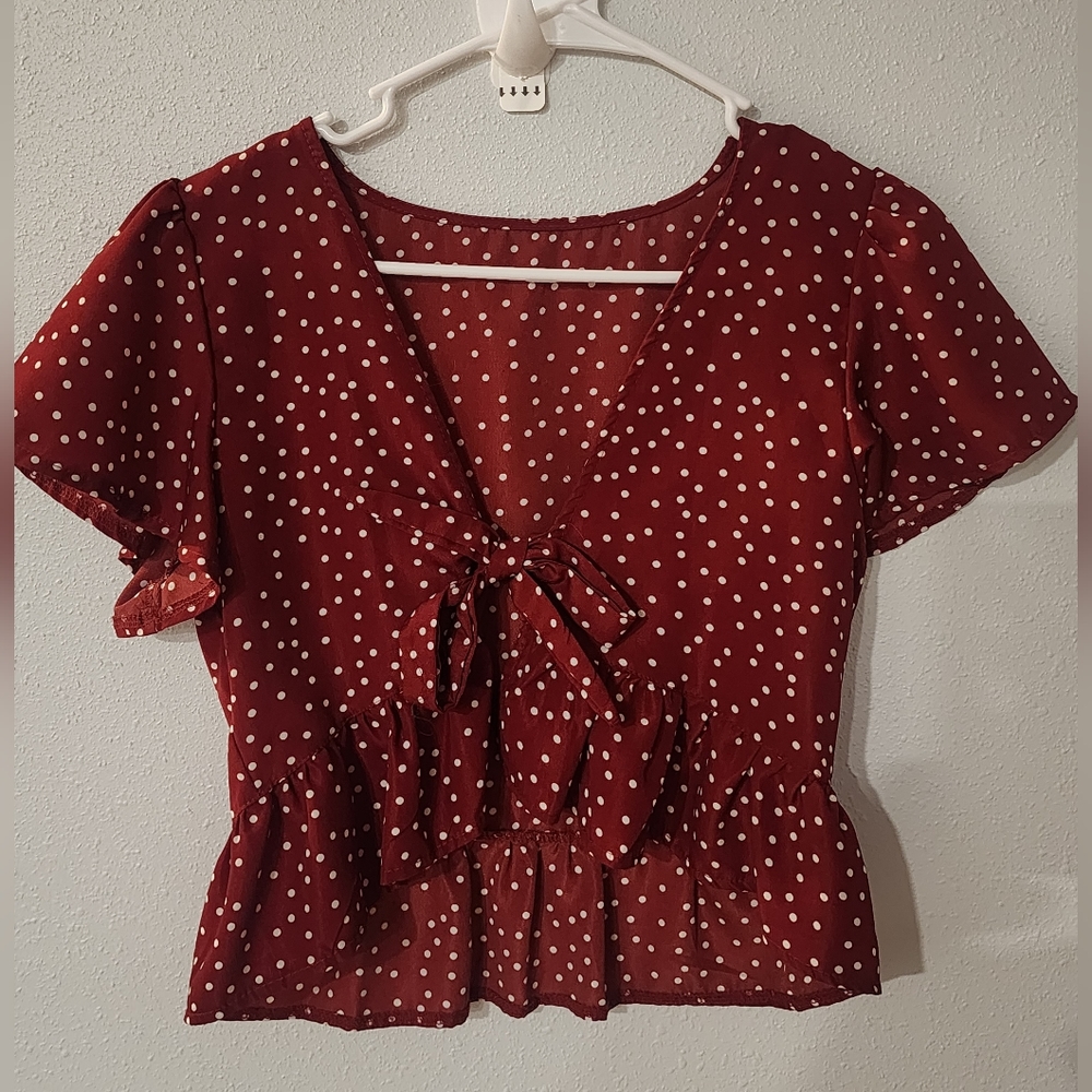Burgundy polka dot tie front ruffle edge shrug.  Size S